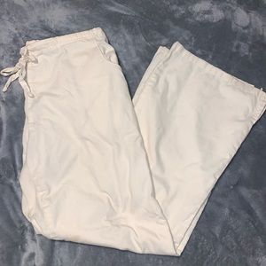 Soft scrubs cream scrub pants. Size large